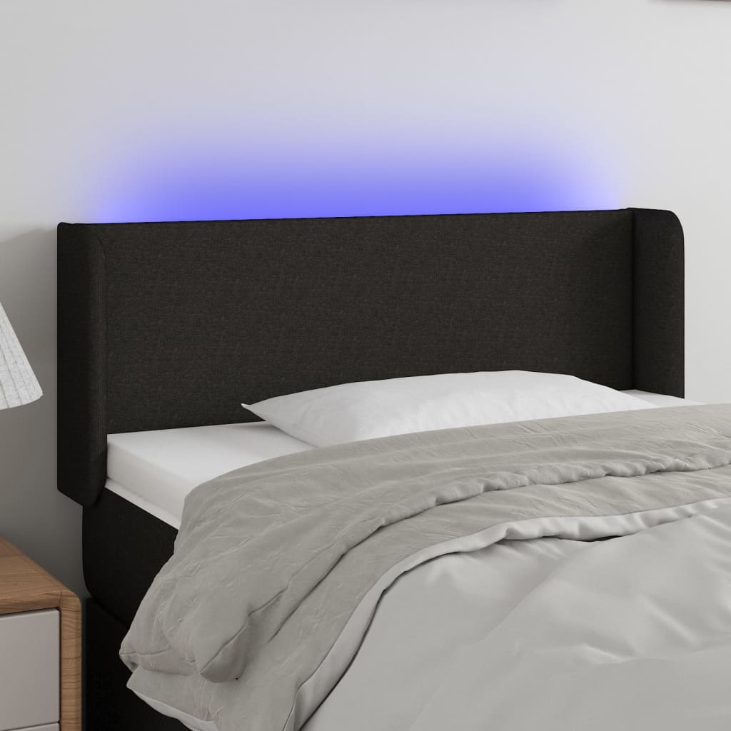 sengegavl med LED-lys 83x16x118/128 cm stof mørkegrå