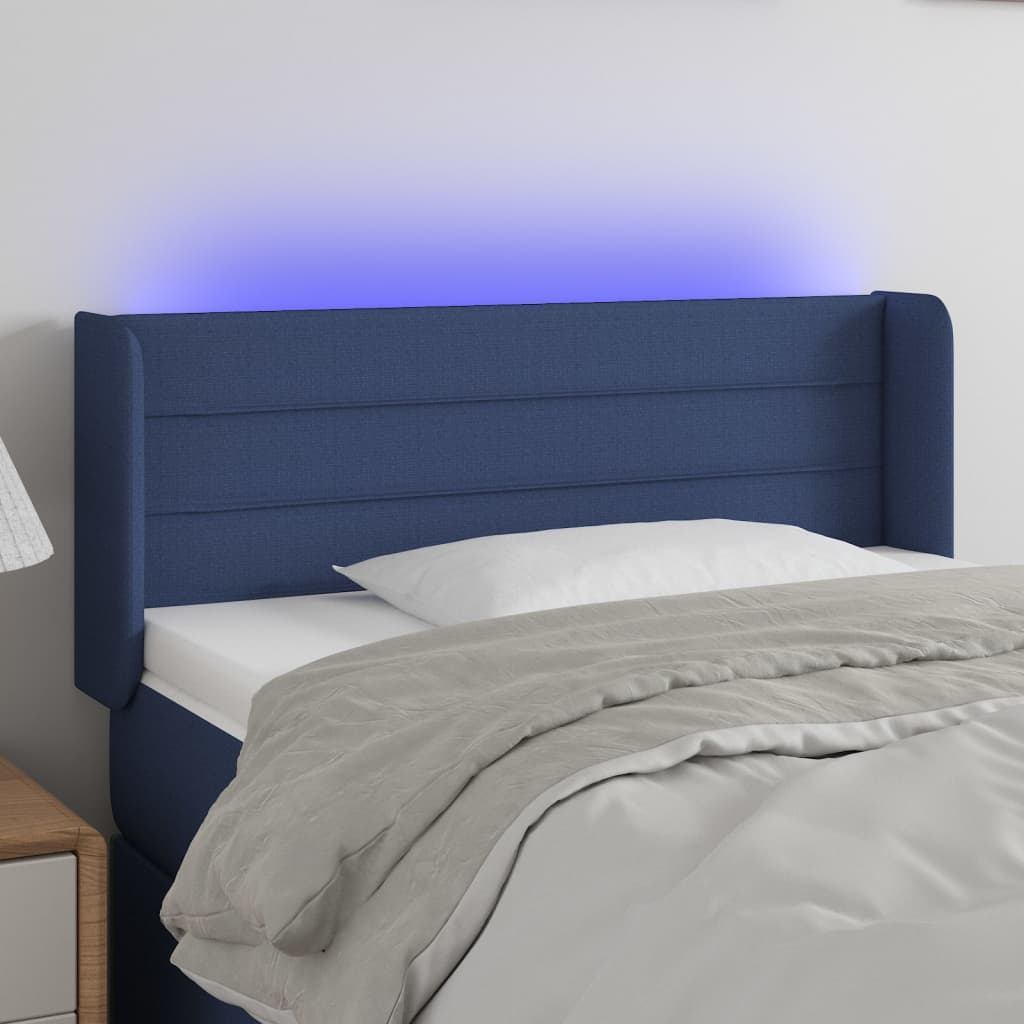 sengegavl med LED-lys 147x16x78/88 cm stof blå