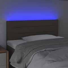 sengegavl med LED-lys 100x5x78/88 cm stof mørkebrun