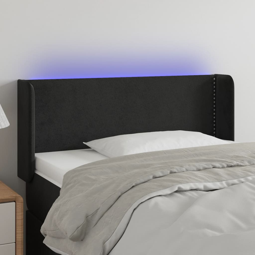 sengegavl med LED-lys 93x16x118/128 cm fløjl sort