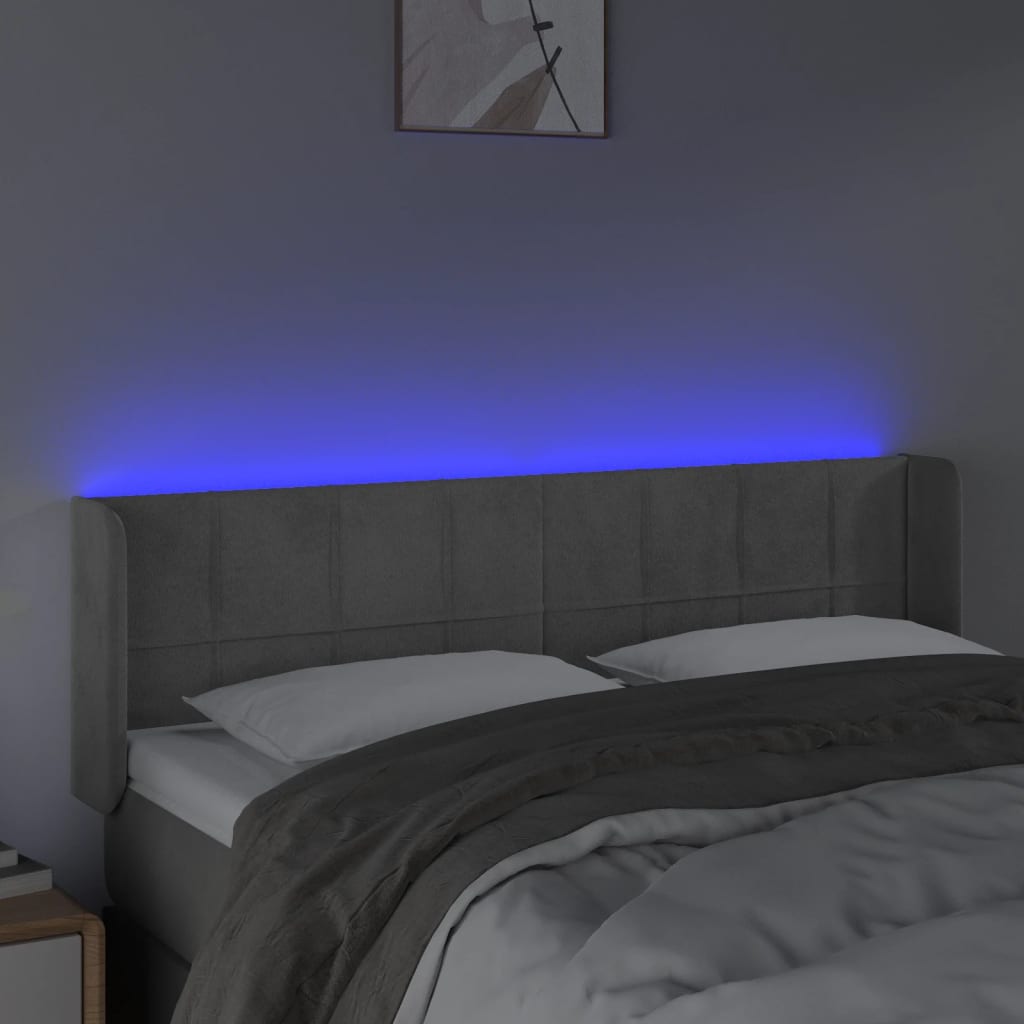 sengegavl med LED-lys 83x16x118/128 cm fløjl lysegrå